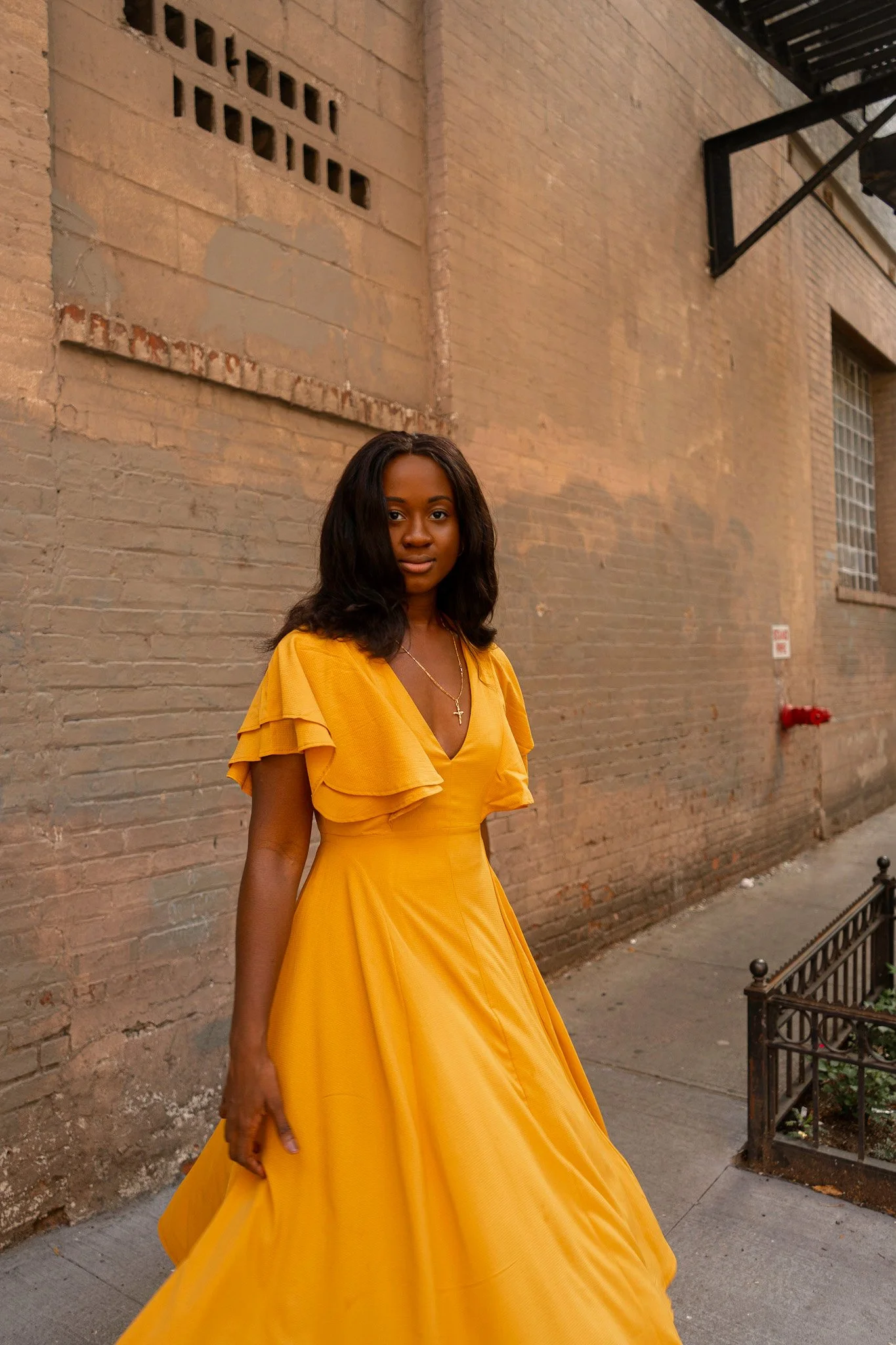Nana Yaa Ansah in a yellow dress